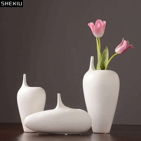 Elegant White Ceramic Vase ceramic vases Julia M Home & Kitchen   